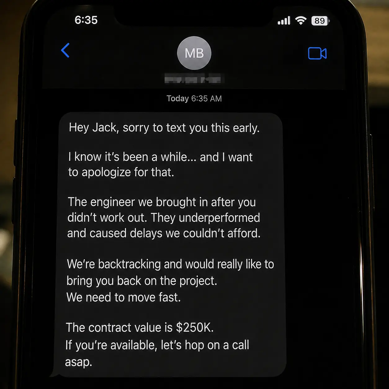 A text message from a client who had gone quiet, apologising and asking to bring the narrator back on the project